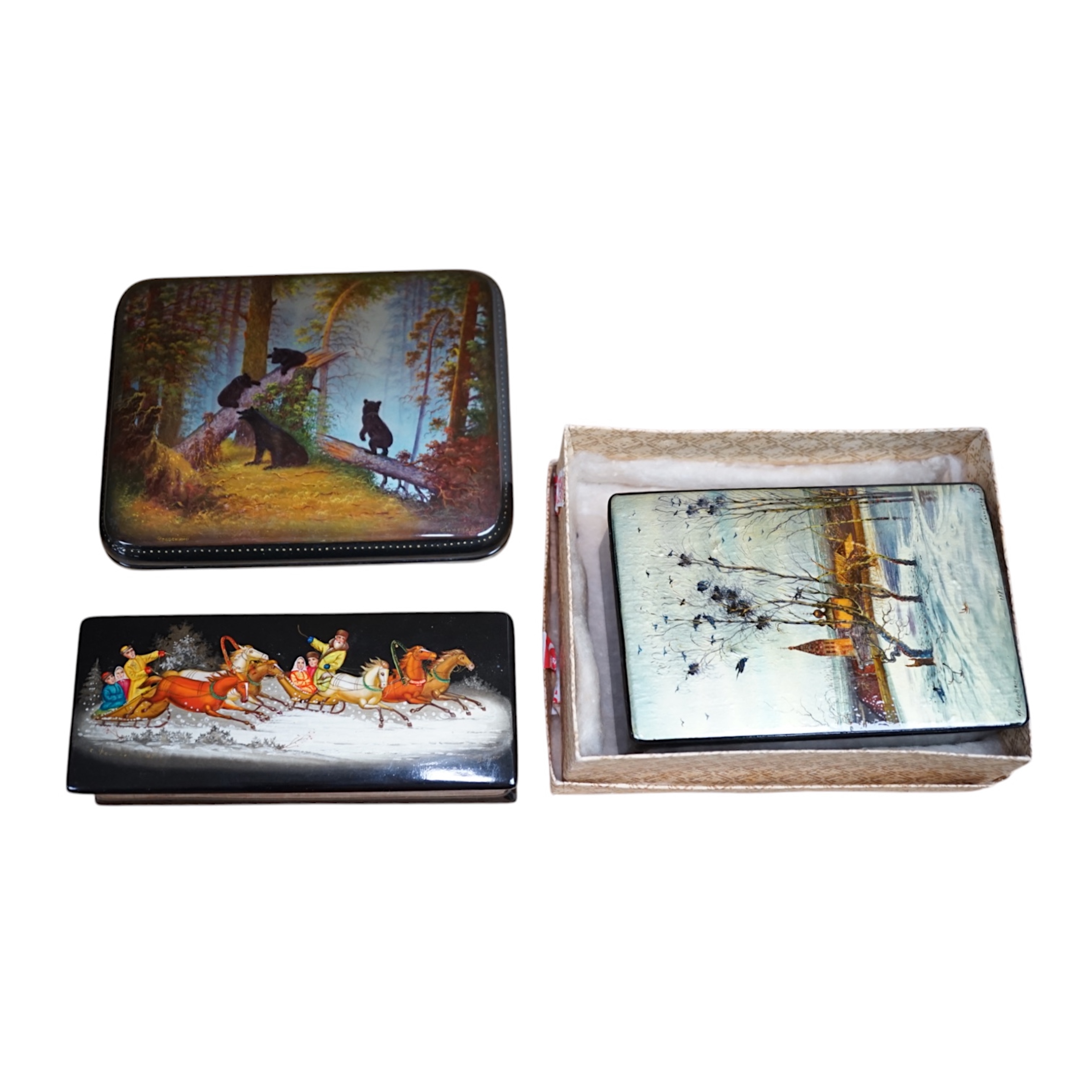 Three Russian lacquer boxes, largest 16.5cm x 13cm. Condition - good